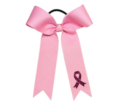 Pink hair bow with a black ribbon symbol on a white background