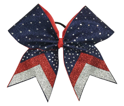 Navy, red, and silver glittery and rhinestone cheer bow on a white background