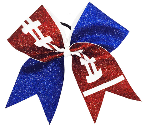Brown football and royal blue glittery bow with white logo on a white background