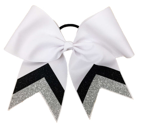 White hair bow with black and silver glitter tails on a white background