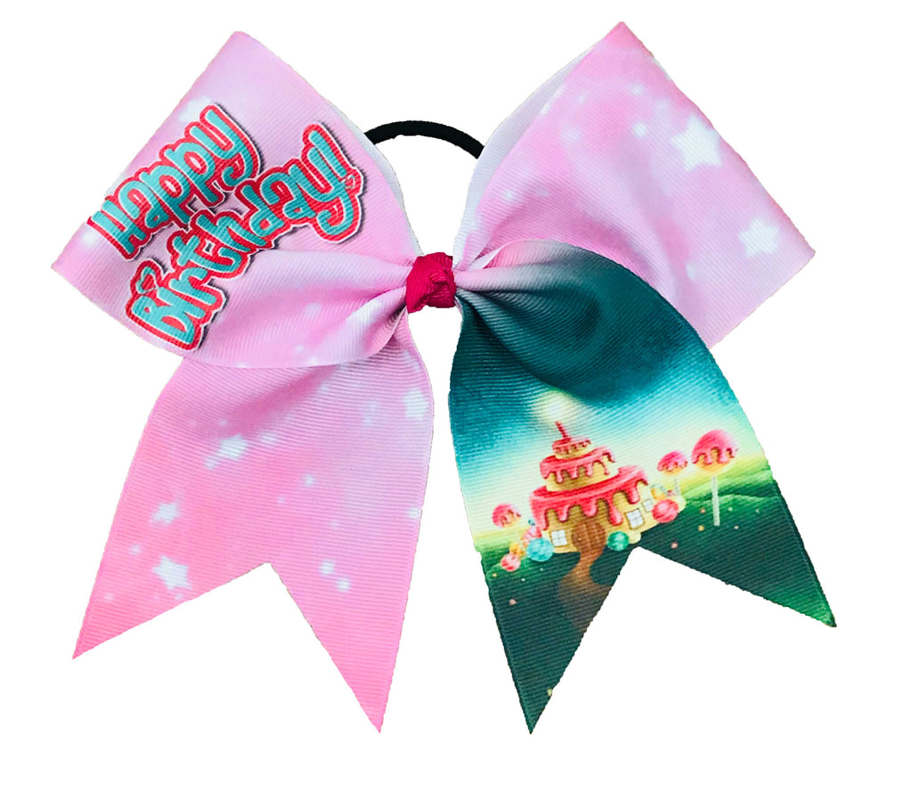Large pink and green bow with 'Happy Birthday' text and a cake design on a white background