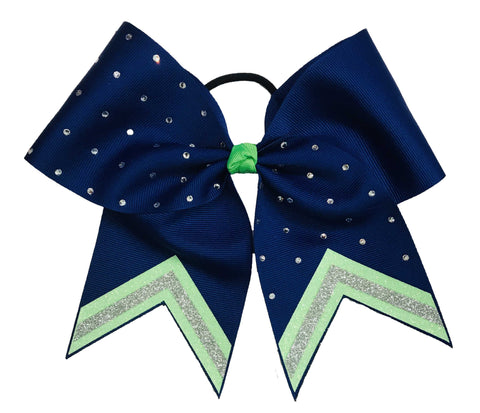 Royal blue hair bow with neon green and silver accents on a white background