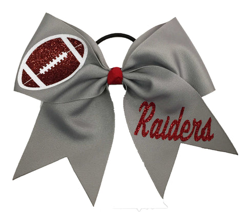 Gray bow with football design and 'Raiders' text on a white background
