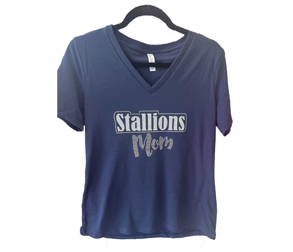 Navy blue t-shirt with 'Stallions Mom' in gitter and rhinestones  on a hanger against a white background