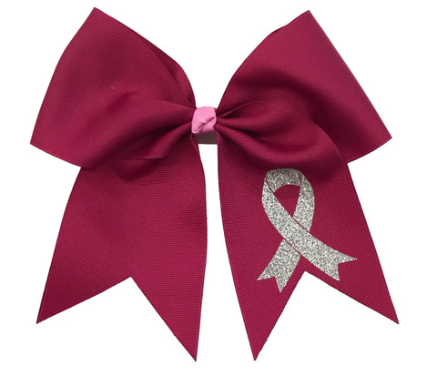 Hot Pink bow with a silver awareness ribbon symbol on a white background
