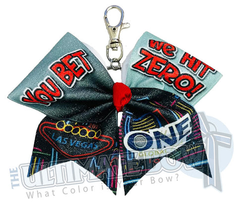 The ONE - Exclusive You Bet We Hit Zero at The ONE Event Glitter Key Chain Cheer Bow 2023 | Las Vegas
