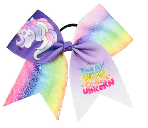 Colorful purple bow with unicorn design and text on a white background