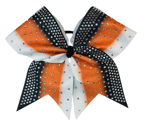 Decorative hair bow with orange, black, and white colors and rhinestone embellishments on a white background.