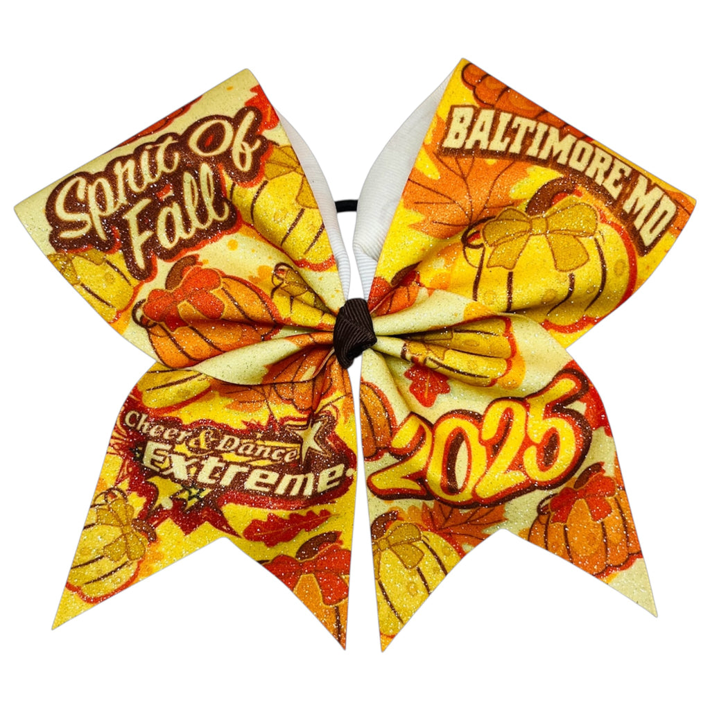 Cheerleading bow with autumn-themed design and text on a white background