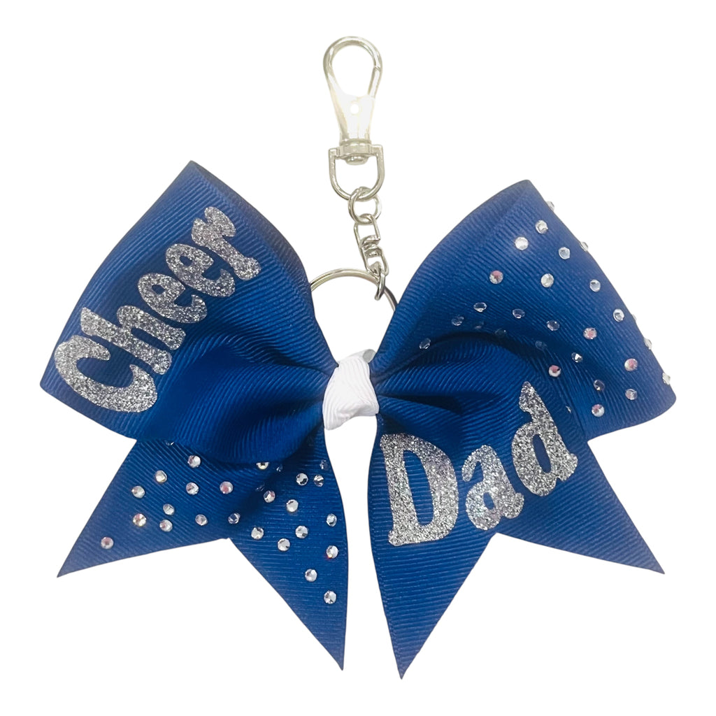 Royal Blue bow keychain with 'Cheer Dad' text and rhinestones on a white background