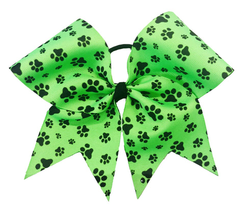 Neon Green bow with black paw prints on a white background