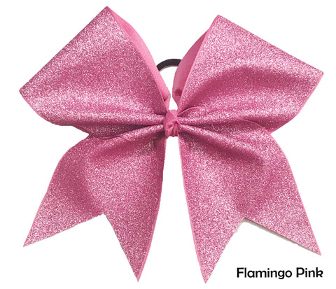 Flamingo pink glittery cheer bow on a white background