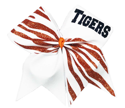 White glitter Cheer bow with tiger stripe pattern and 'TIGERS' text on a white background