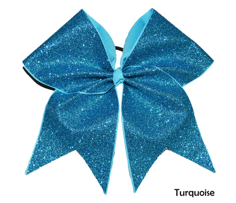 Turquoise glitter cheer bow on a white background