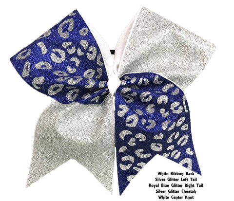 Cheerleading bow with royal blue and silver cheetah design on a white background