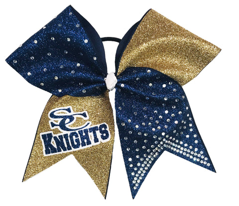 Navy and gold glittery cheer bow with 'SC Knights' text and silver rhinestones on a white background