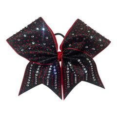 Black and red glittery bow with red and clear rhinestones on a white background
