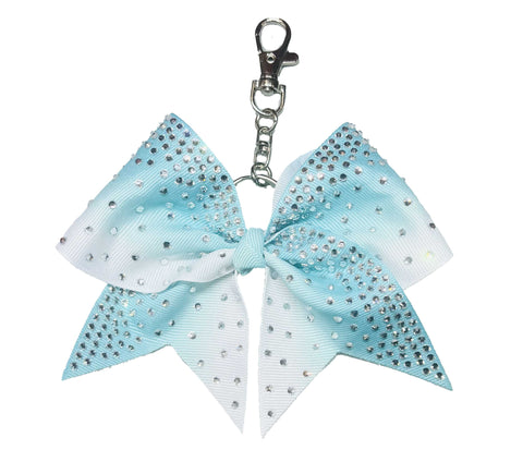 Aqua to white ombre bow keychain with rhinestones on a white background