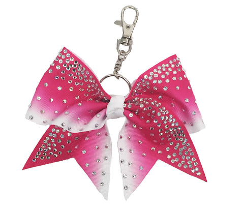hot Pink to white ombre bow keychain with rhinestones on a white background
