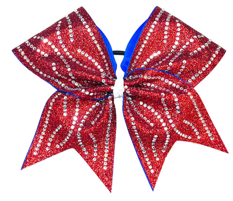 Red glittery bow with electric blue back and rhinestone waves on a white background