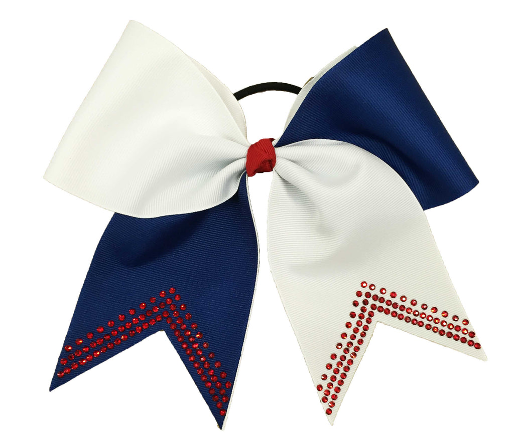Large white and royal blue hair bow with red rhinestone accents on a white background