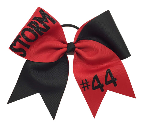 Red and black softball hair bow with 'STORM' and '#44' text on a white background