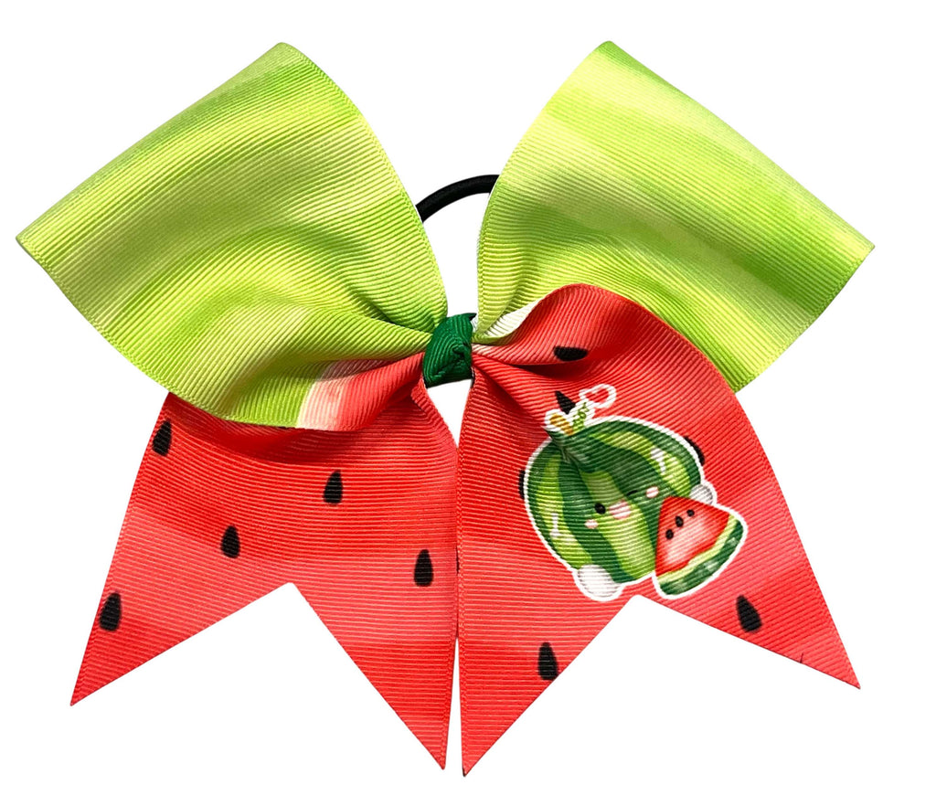 A watermelon-themed hair bow with a large lime green top loop and two red lower loops printed with watermelon seeds and a cartoon watermelon graphic, attached to a black elastic band on a white background.