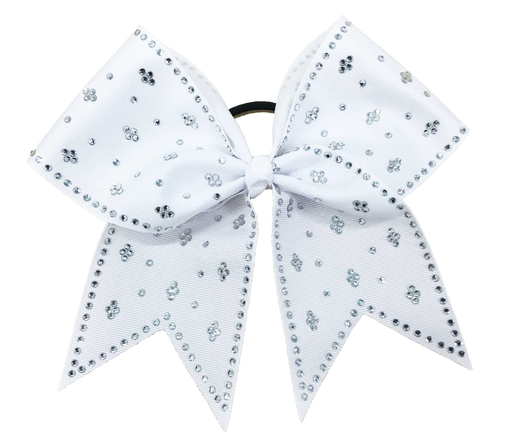 White bow with silver rhinestones on a white background