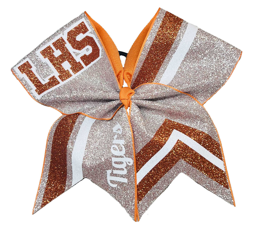 Orange and silver Glittery cheer bow with 'LHS Tigers' text on a white background