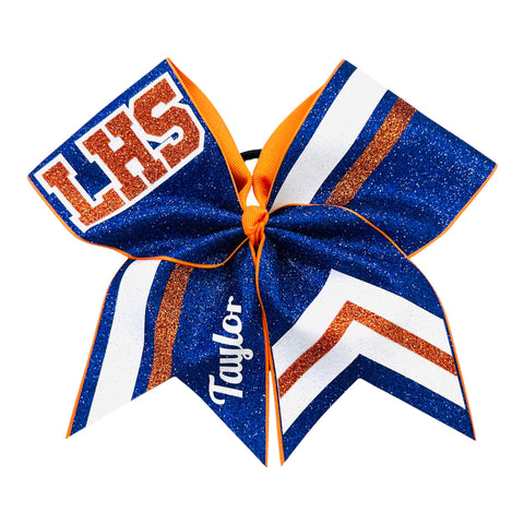 A custom cheerleader hair bow featuring a royal blue glitter finish with orange and white stripes, personalized with 'LHS' and 'Taylor' in white and orange lettering.