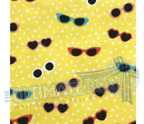 Bright yellow fleece | White Polka Dots | Multicolor Sunglasses | Scrunchies